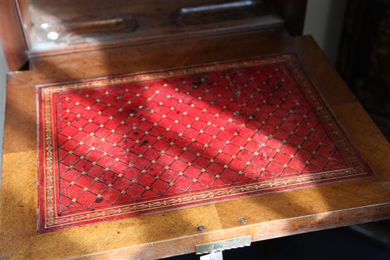 Attributed to Charles Lock Eastlake. A Victorian Aesthetic movement walnut writing desk, W.2ft D.1ft 6in. H.4ft 9in.